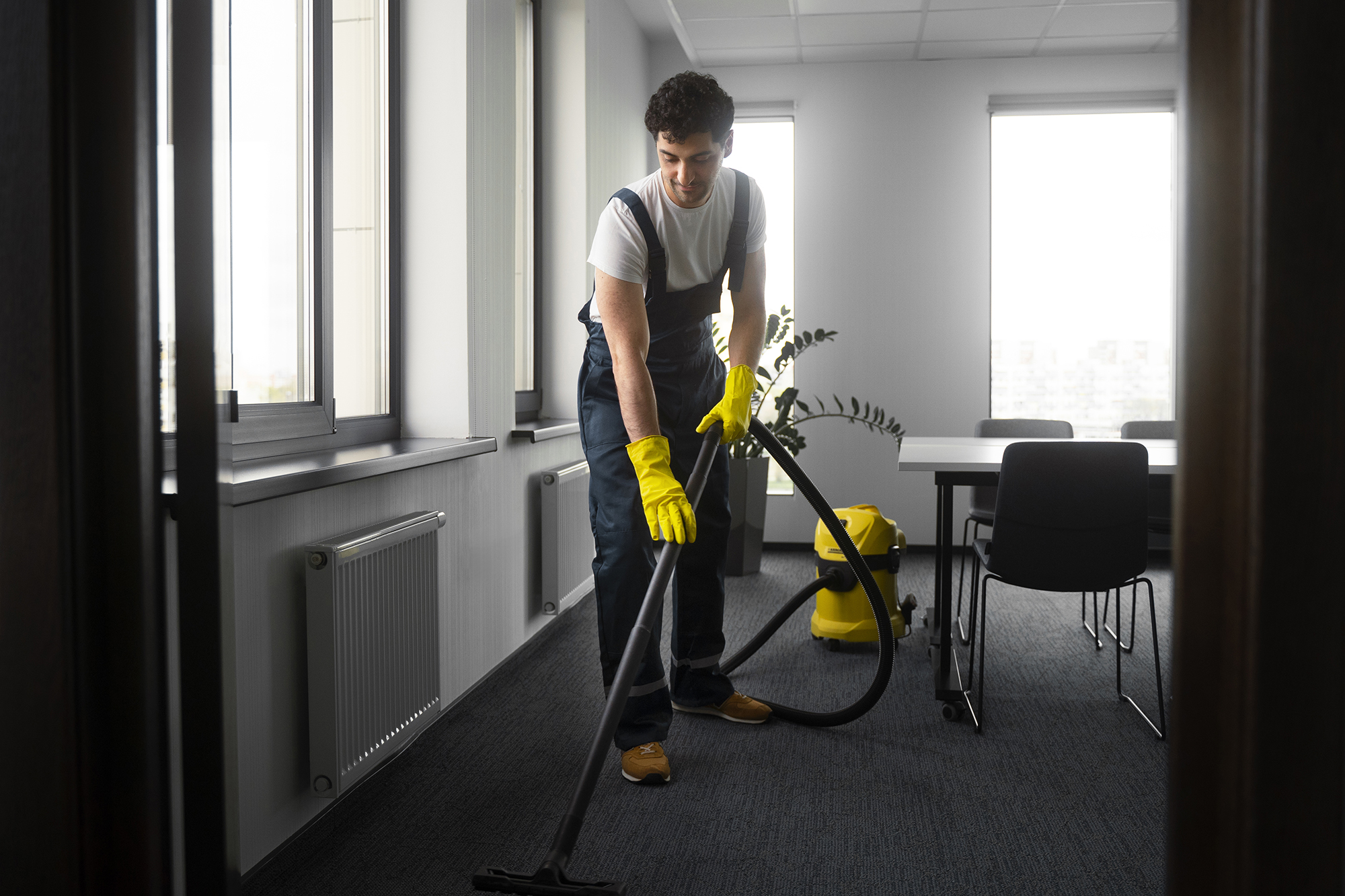 full shot man cleaning indoors2